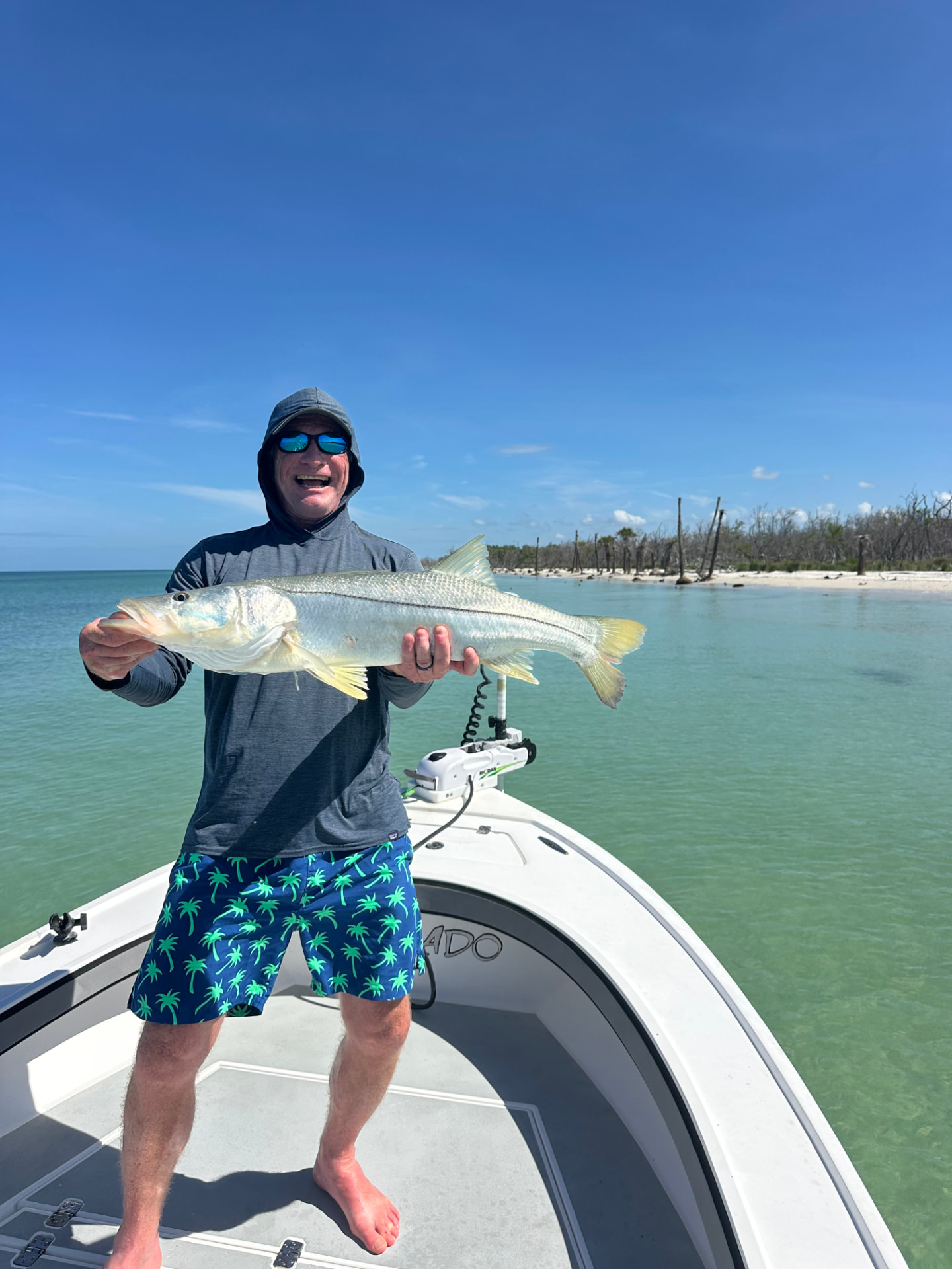 Angler with a big snook caught on a Naples fishing charter